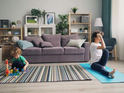 Simple yoga mat and blocks in a minimal room.